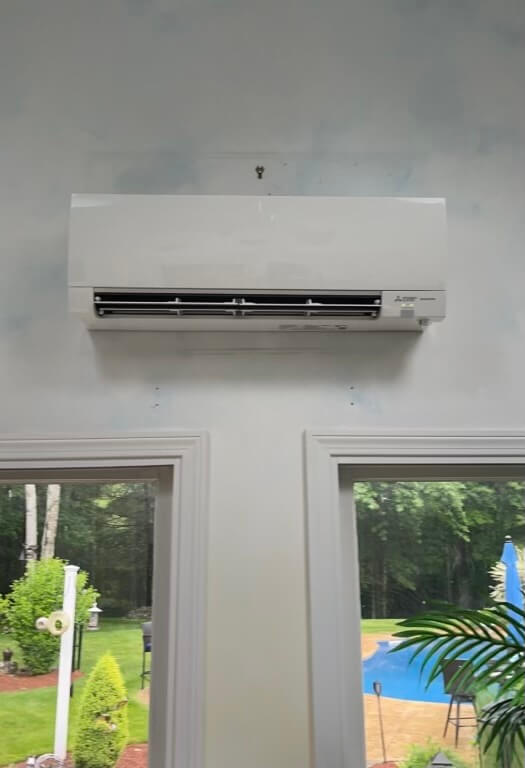 Mitsubishi ductless mini-split unit mounted on wall