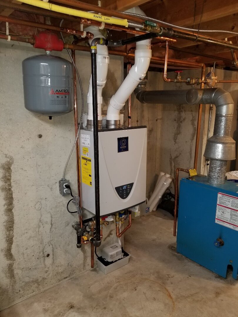 Tankless water heater with expansion tank