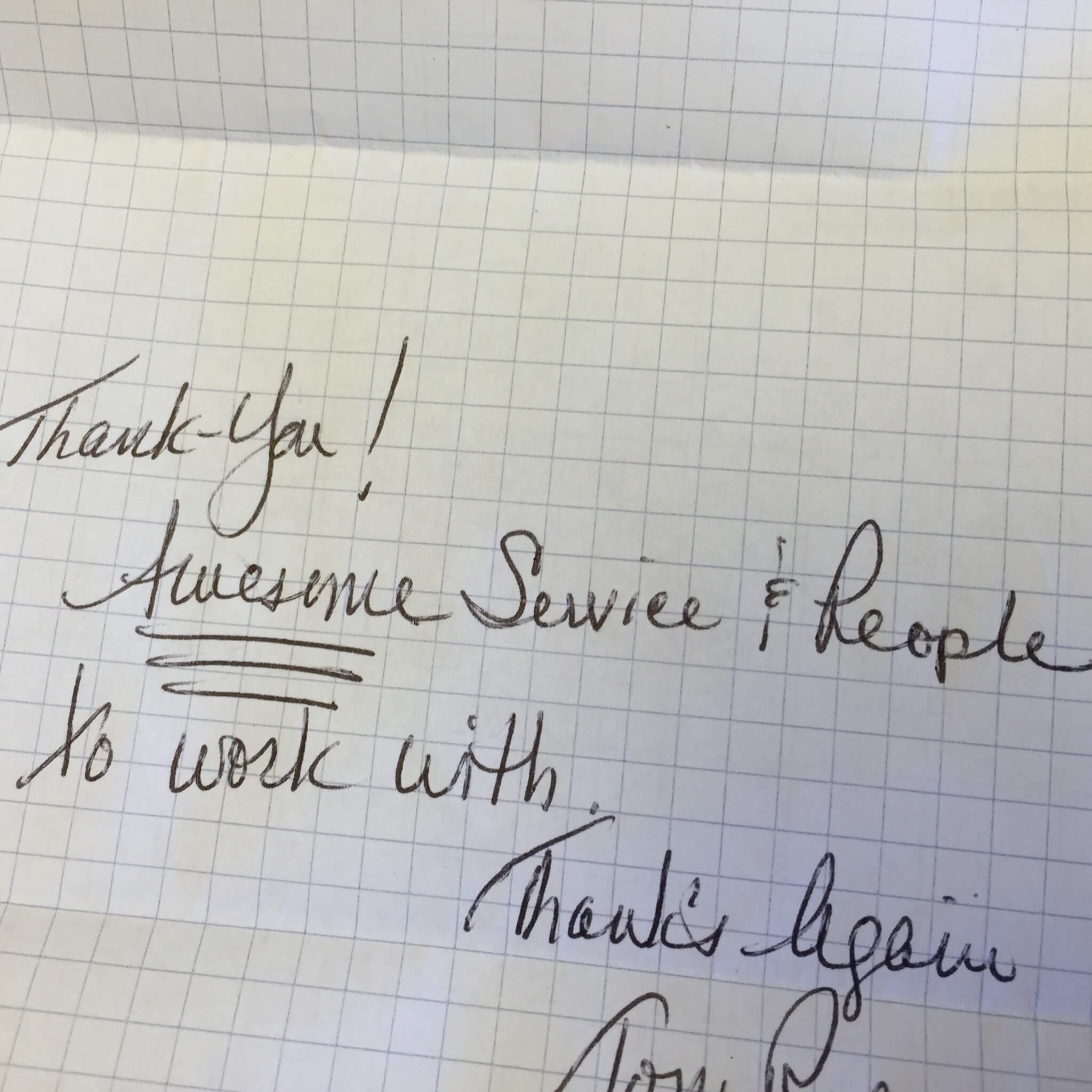 Handwritten note saying awesome service and people to work with